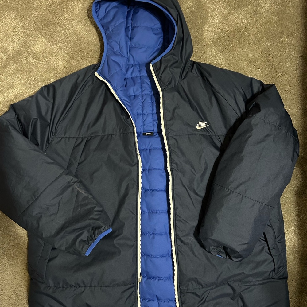 Nike down coat. Reversible and only worn twice. Like new.